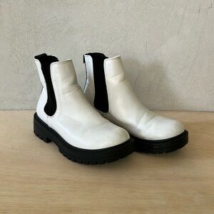 White and black boots size 5.5